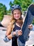 Teen girl rides his skateboard