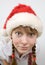 Teen girl in Santa hat