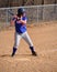 Teen Girl Softball Player Batting