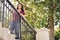 Teen Girl Standing on Stairway