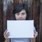 Teen girl with a white banner in the hands