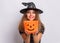 Teen girl in witch black hat