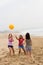 Teen girls playing volleyball