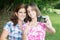 Teen and her young mother taking a self picture