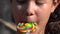 Teen Hispanic Girl Eating Lollipop