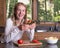 Teen holding a big sandwich