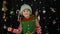 Teen kid girl in Christmas elf Santa Claus helper costume. Child doing winner gesture, say Yes