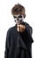 Teen with makeup skull points finger