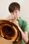 Teen playing gold trumpet