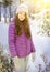 Teen pretty girl in winter dawn jacket in park