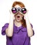 Teen red-haired girl with binoculars