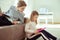 Teen schoolchildren working with tablet at home during coronavirus quarantine