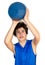 Teen sportsman holding basketball