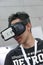 Teen wearing Virtual reality device testing flight simulator