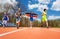Teenage athletes with German flag running on track