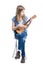 Teenage, blond girl in blue T-shirt is sitting and playing concert on ukulele instrument