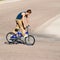 Teenage boy doing tricks on a BMX bike.