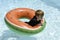 Teenage boy in floatie