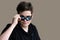 Teenage boy with modern sunglasses