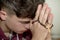 Teenage boy praying