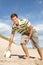 Teenage Boy With Rugby Ball On Beach