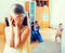 Teenage boy with sisters playing hide-and-go-seek