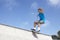 Teenage Boy In Skateboard Park