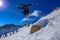 Teenage boy ski jumping in Alta, Utah