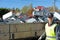 Teenage boy volunteering for a christian charity organization collecting electonic waste to raise money for missionaries