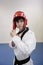 Teenage boy wearing martial arts headgear while looking away