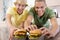 Teenage Boys Eating Burgers