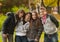 Teenage boys and girls having fun in the park