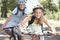 Teenage Couple Cycling Through Countryside