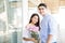 Teenage Couple With Flower Bouquet Dating In Shopping Mall