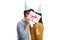 Teenage couple with party hats kissing behind a present