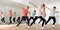 Teenage dancers practicing active vigorous dance in modern studio