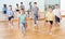 Teenage dancers practicing new dance in studio