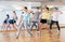 Teenage dancers practicing new dance in studio