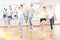 Teenage dancers practicing new dance in studio