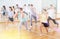 Teenage dancers practicing new dance in studio