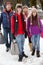 Teenage Family Carrying Shopping