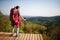 Teenage female hiker watching at distance