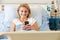 Teenage Female Patient Using Mobile Phone In Hospital Bed