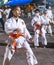 Teenage Filipina girls,practice Karate moves outside at night,on Rizal Boulevard