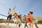 Teenage Friends Playing Volleyball On Beach