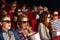 Teenage Friends Watching 3D Film In Cinema
