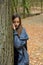 Teenage girl in autumn forest