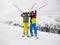 Teenage girl and boy skiing