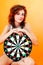 Teenage Girl and Dartboard