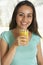 Teenage Girl Drinking Fresh Orange Juice